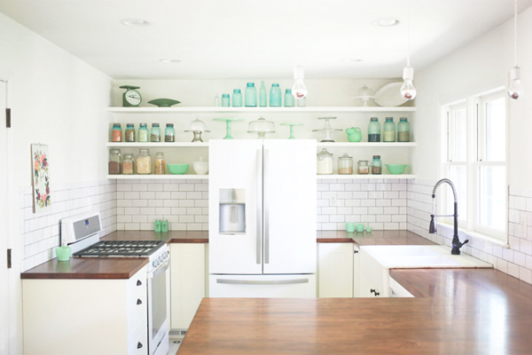 A kitchen with white appliances