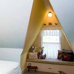 attic-bedroom-window-seat Window seat in attic bedroom