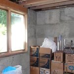 basement-remodel-before-ten-directions-design Unfinished basement before Ten Directions Design remodel