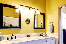 Bathroom with yellow wall paint