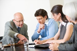 Couple negotiating house purchase