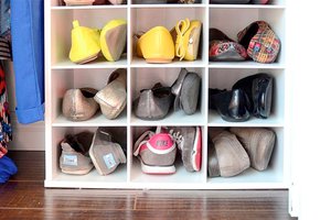 Shoes organized in a home closet