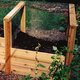 Two-bin compost bin made of cedar wood