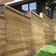 Wooden fence in yard of residence