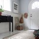 Foyer with side table, seating and coat hooks