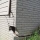 Large foundation crack on the corner of a house