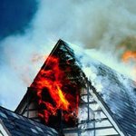 house-attic-burning-fire-insurance-masterfile House on fire