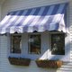 Striped awning on a house