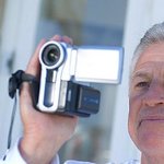 man-camcorder-home-inventory-getty Man using a camcorder to record home inventory
