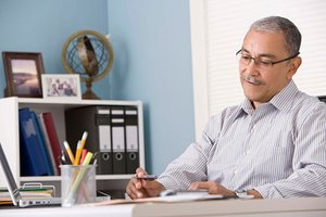 Man sitting at desk in home office
