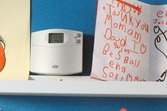 Programmable thermostat in family home