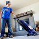 Woman vacuuming during spring cleaning