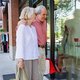 Couple window shopping in a walkable community