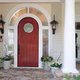 Lovely entry door with circular window and side lights