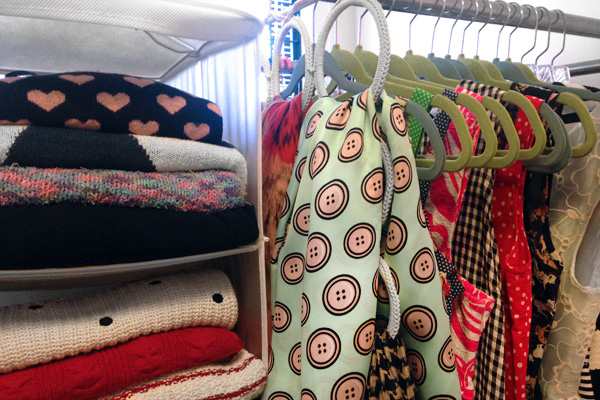 Clothes organized in a closet