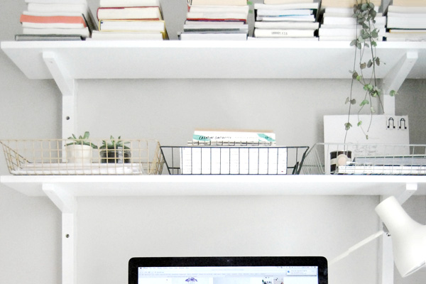 Home office with paperwork on shelves